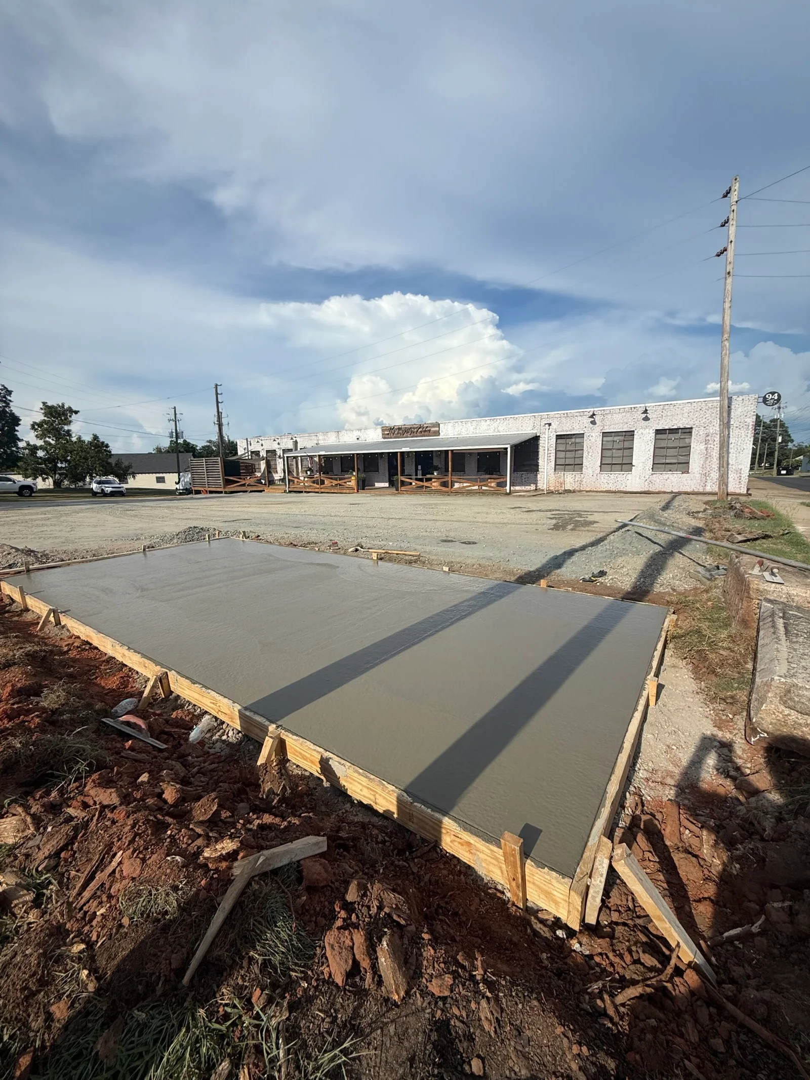 Concrete Parking Lot & Dumpster Pad 1